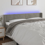 Hoofdbord 163x16x78/88 cm fluweel lichtgrijs LED