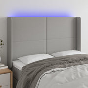 Hoofdbord 147x16x118/128 cm stof lichtgrijs LED