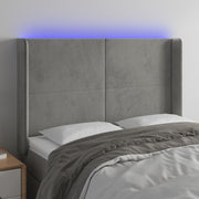 Hoofdbord 147x16x118/128 cm fluweel lichtgrijs LED