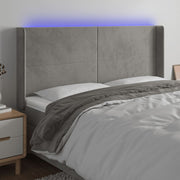Hoofdbord 183x16x118/128 cm fluweel lichtgrijs LED