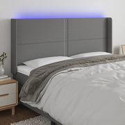 Hoofdbord 183x16x118/128 cm stof donkergrijs LED