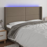 Hoofdbord 203x16x118/128 cm stof taupe LED