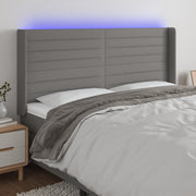 Hoofdbord 163x16x118/128 cm stof donkergrijs LED