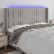 Hoofdbord 163x16x118/128 cm stof lichtgrijs LED