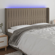 Hoofdbord 203x16x118/128 cm stof taupe LED