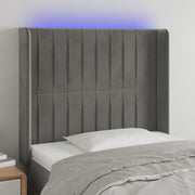 Hoofdbord 83x16x118/128 cm fluweel lichtgrijs LED