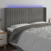 Hoofdbord 163x16x118/128 cm fluweel lichtgrijs LED