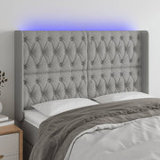 Hoofdbord 147x16x118/128 cm stof lichtgrijs LED