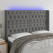 Hoofdbord 147x16x118/128 cm stof donkergrijs met LED