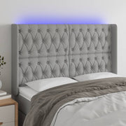 Hoofdbord 163x16x118/128 cm stof lichtgrijs LED