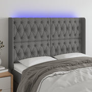 Hoofdbord 163x16x118/128 cm stof donkergrijs LED
