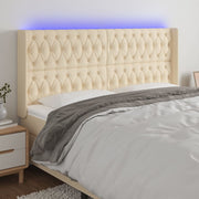 Hoofdbord 183x16x118/128 cm stof crèmekleurig LED