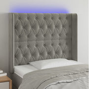 Hoofdbord 93x16x118/128 cm fluweel lichtgrijs LED