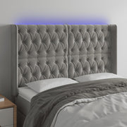 Hoofdbord 163x16x118/128 cm fluweel lichtgrijs LED