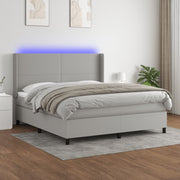 Boxspring 160x200 cm lichtgrijs met matras en LED