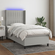 Boxspring met matras 90x190 cm lichtgrijs LED
