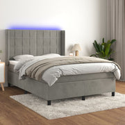 Boxspring 140x190 cm fluweel lichtgrijs met matras en LED