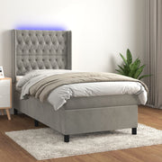 Boxspring 90x200 cm fluweel lichtgrijs met matras en LED