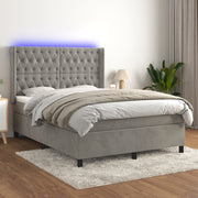 Boxspring 140x190 cm lichtgrijs fluweel met matras en LED