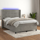 Box spring with mattress and LED velvet light gray 140x190 cm