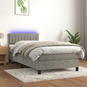 Boxspring 90x200 cm fluweel lichtgrijs met matras en LED