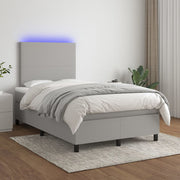 Boxspring met matras 120x200 cm lichtgrijs LED