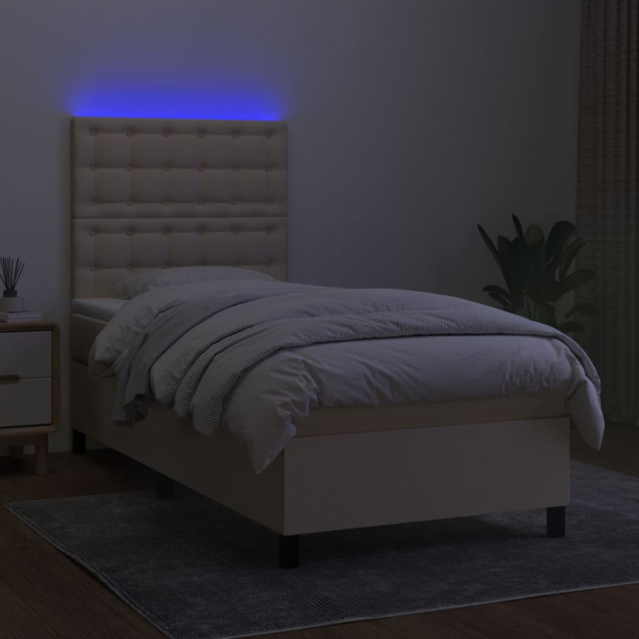 Boxspring met matras en LED stof crèmekleurig 90x190 cm