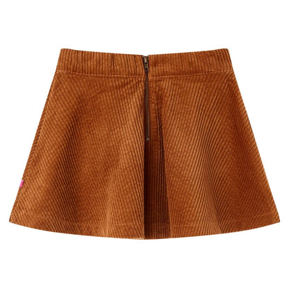 Kinderrok met zakken ribfluweel 116 cognackleurig Cognac