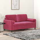 Two-seater sofa with decorative cushions 140 cm velvet wine red