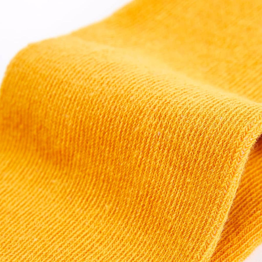 Kindermaillot 128 okerkleurig Oker