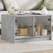 Salontafel 68x50x42 cm betongrijs met glazen deuren