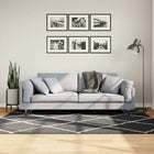 Vloerkleed shaggy 140x200 cm zwart crème