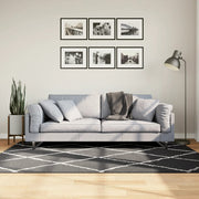 Vloerkleed shaggy 140x200 cm zwart crème