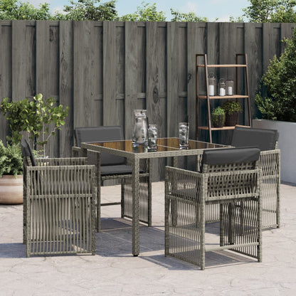 Tuinstoelen 4 st met kussens poly rattan grijs