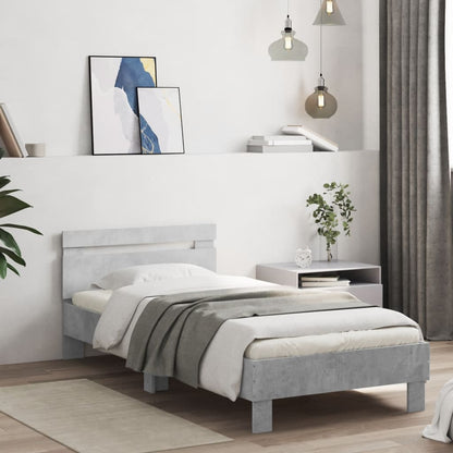 Bedframe met hoofdbord en LED-verlichting betongrijs 90x200 cm