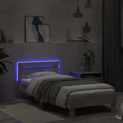 Bedframe met hoofdbord en LED-verlichting betongrijs 90x200 cm