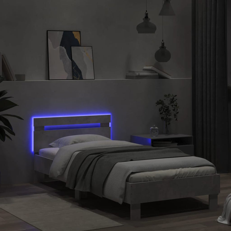 Bedframe met hoofdbord en LED-verlichting betongrijs 90x200 cm