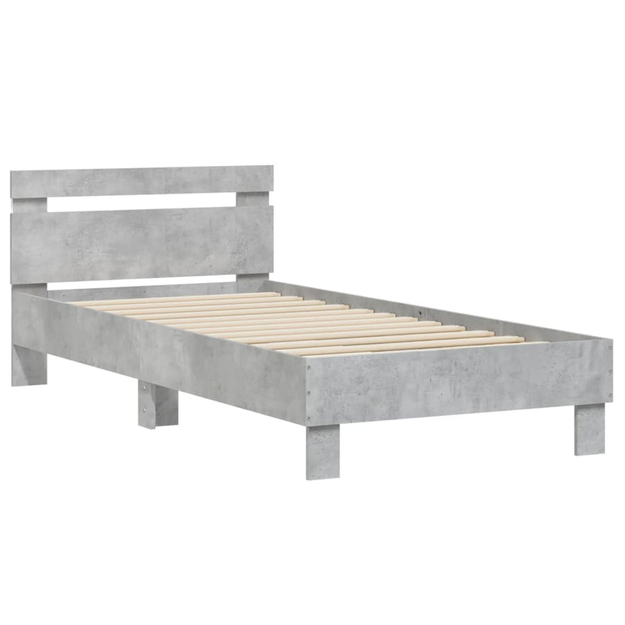Bedframe met hoofdbord en LED-verlichting betongrijs 90x200 cm