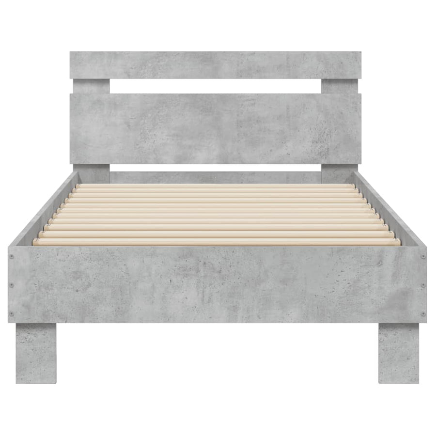 Bedframe met hoofdbord en LED-verlichting betongrijs 90x200 cm