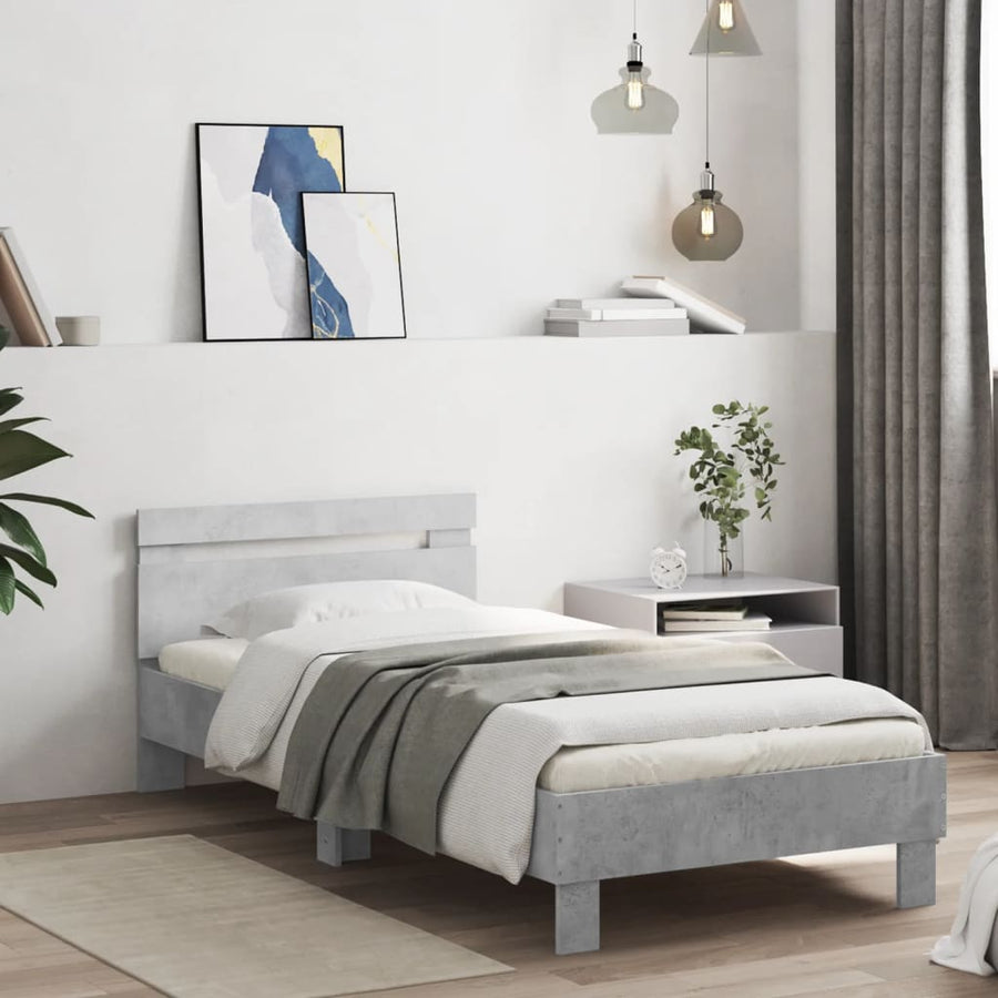 Bedframe met hoofdbord en LED-verlichting betongrijs 90x190 cm
