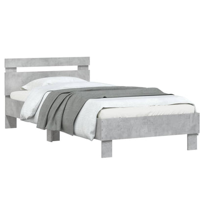 Bedframe met hoofdbord en LED-verlichting betongrijs 90x190 cm