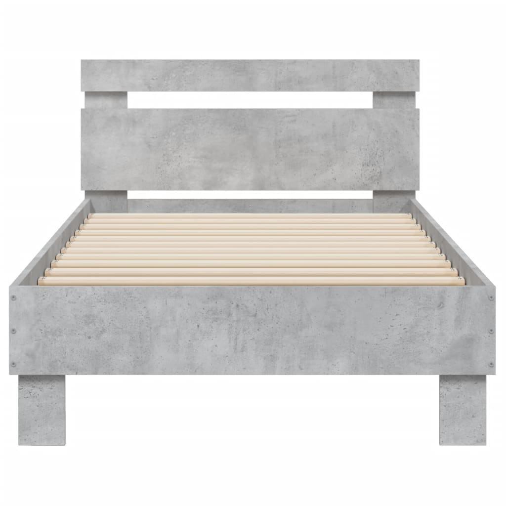 Bedframe met hoofdbord en LED-verlichting betongrijs 90x190 cm