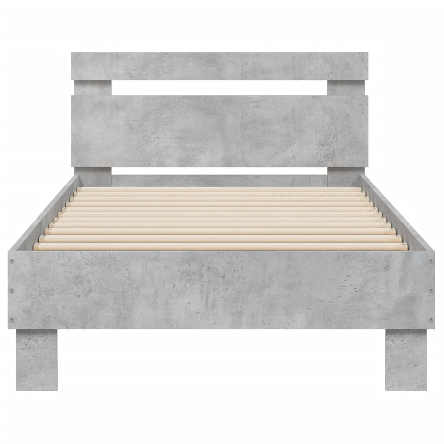 Bedframe met hoofdbord en LED-verlichting betongrijs 90x190 cm