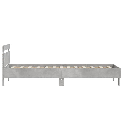 Bedframe met hoofdbord en LED-verlichting betongrijs 90x190 cm