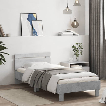 Bedframe met hoofdbord en LED-verlichting betongrijs 75x190 cm