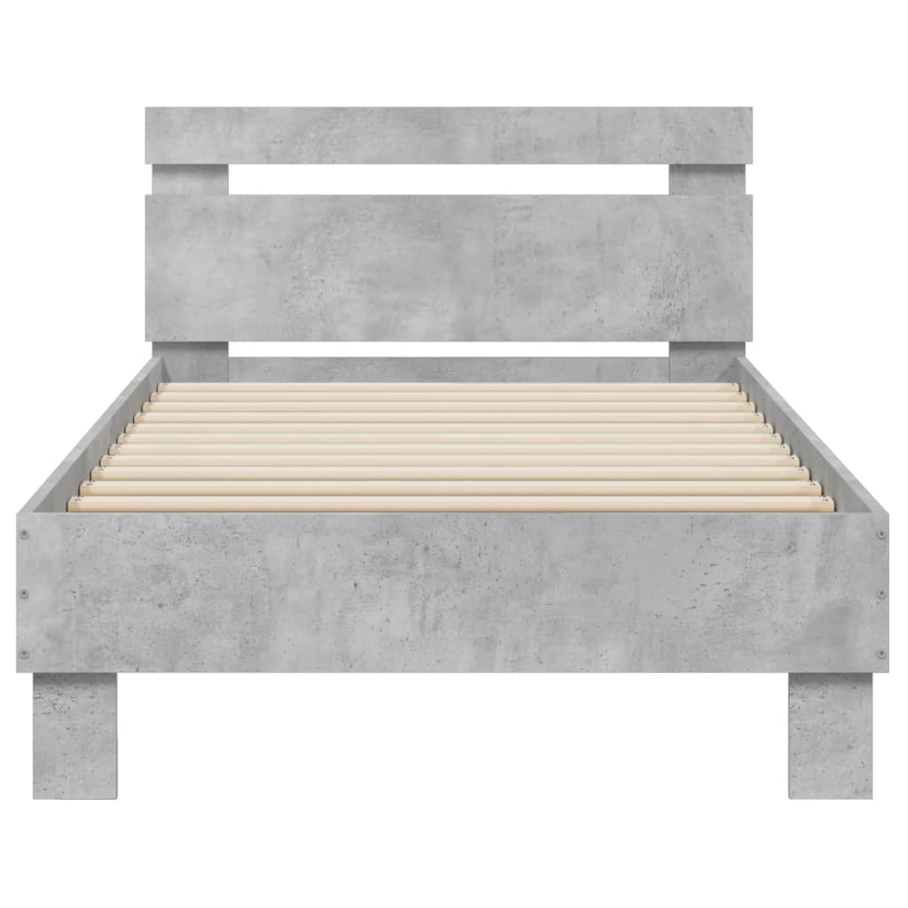 Bedframe met hoofdbord en LED-verlichting betongrijs 75x190 cm