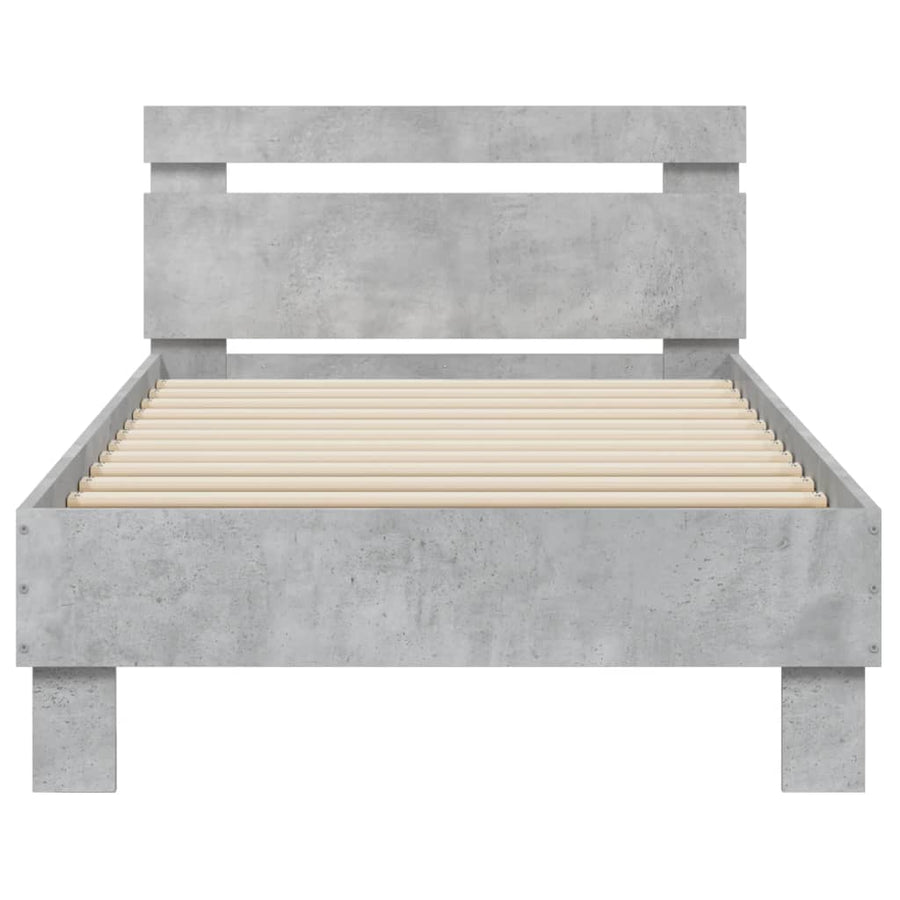 Bedframe met hoofdbord en LED-verlichting betongrijs 75x190 cm