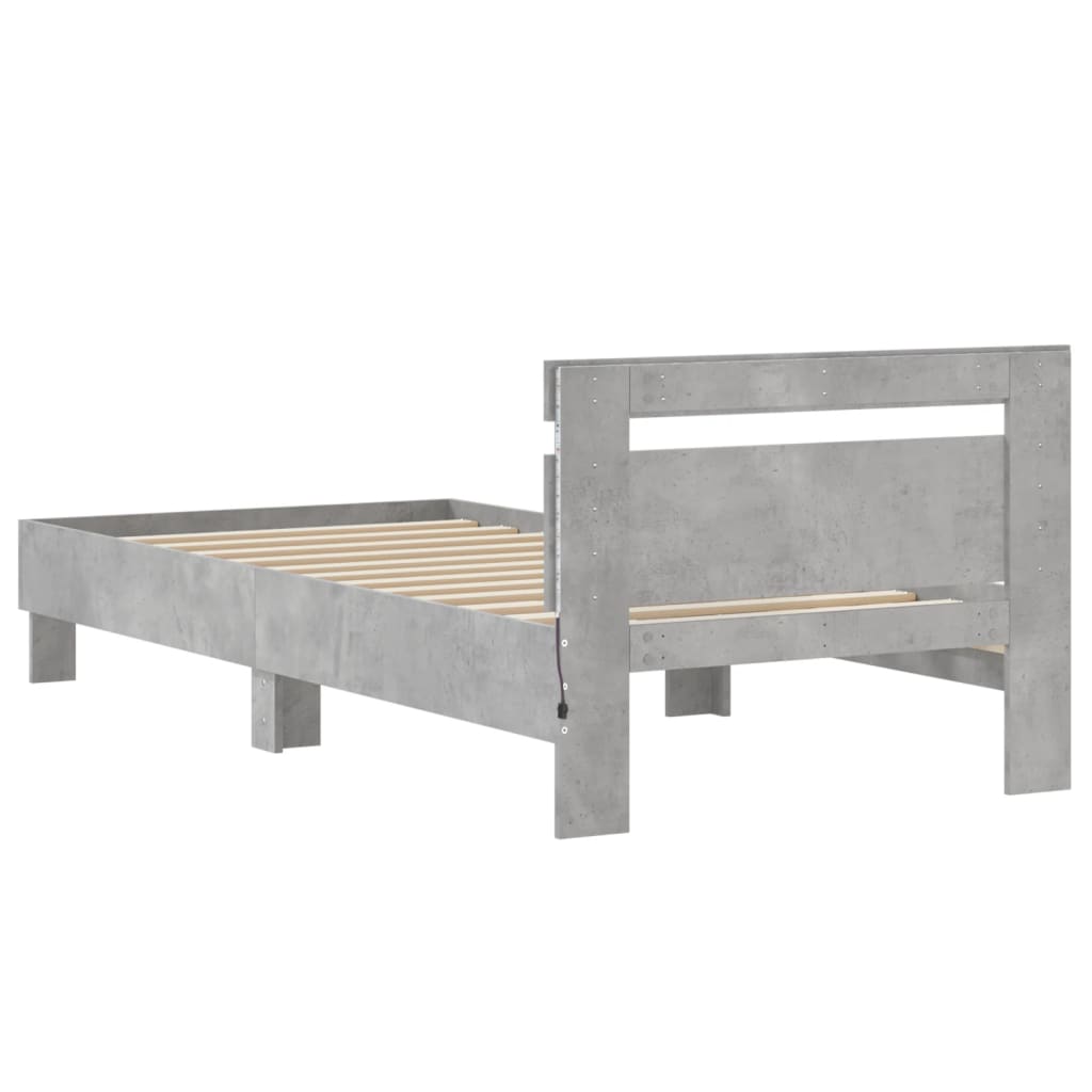 Bedframe met hoofdbord en LED-verlichting betongrijs 75x190 cm