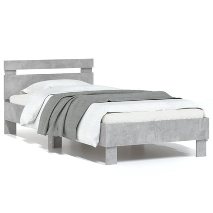 Bedframe met hoofdbord en LED-verlichting betongrijs 75x190 cm
