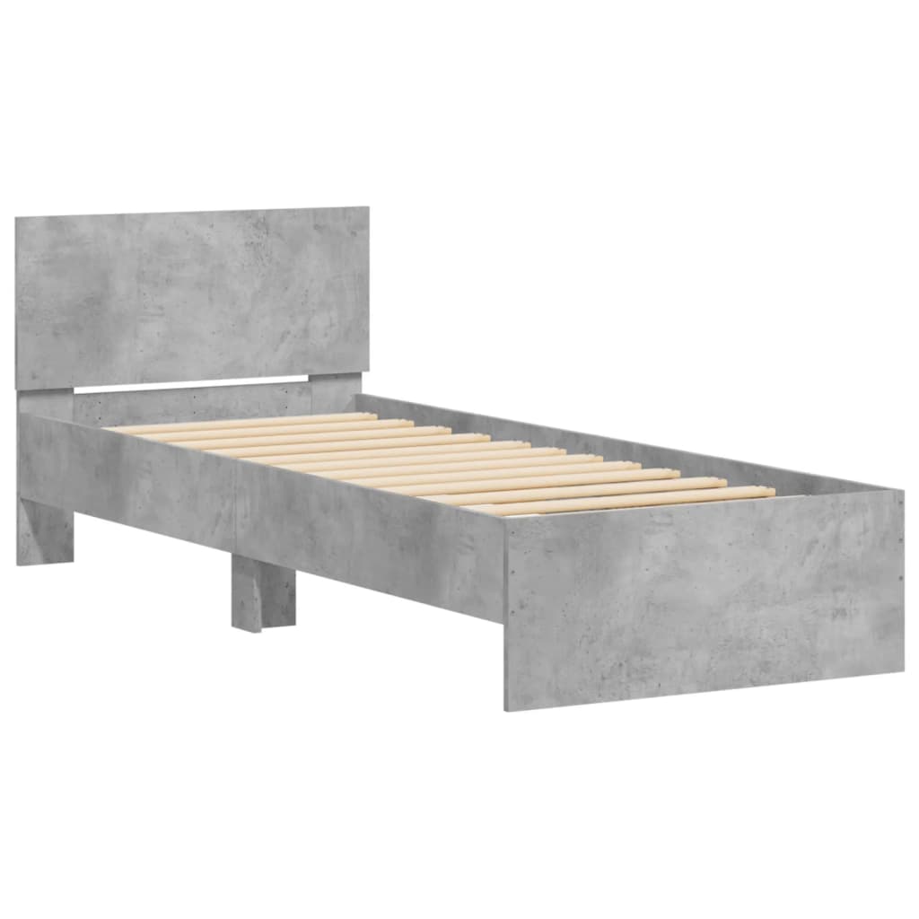 Bedframe met hoofdbord en LED-verlichting betongrijs 90x200 cm